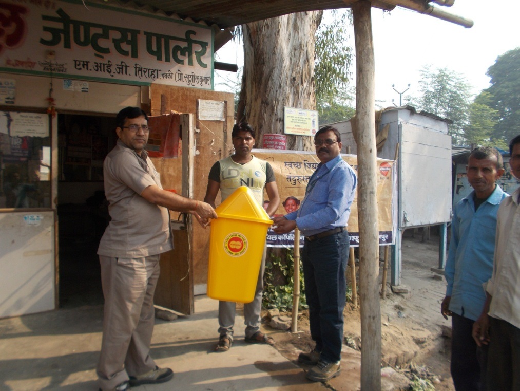 Dust bin handed over to shopkeeper Dust bin handed over to shopkeepers
